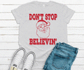 Don't Stop Believing Santa Tee